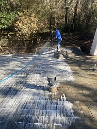 Soft washing a roof in the woodlands